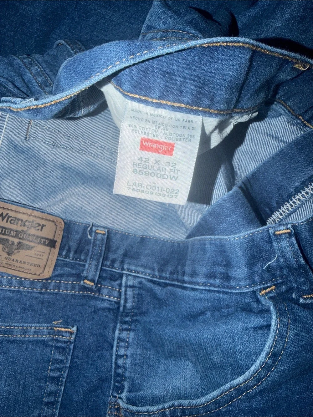 3/$15. Men’s Wrangler jeans 42/32